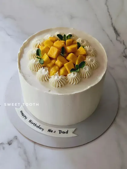 A simple and fresh mango cake for the No. 1 Dad. Sometimes the best cakes are the ones that let the flavor of the fresh fruit shine.
