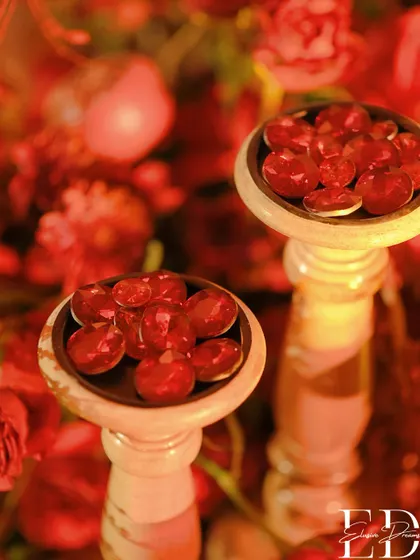 Another angle of the red gems, showing their faceted surfaces catching the light.