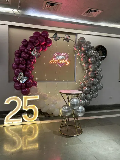 A full view of the 25th-anniversary setup, including the large light-up marquee numbers.
