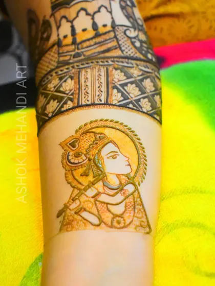A close-up view of the Lord Krishna portrait from the previous design. You can see the fine lines and shading used to create a serene and divine expression.
