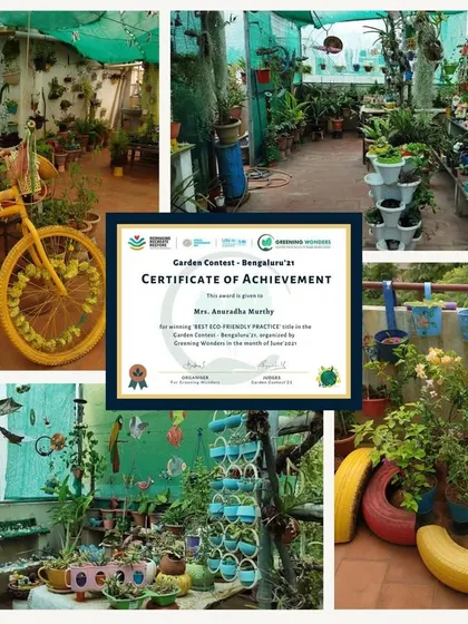 The winner of our 'Best Eco-Friendly Practice' award. This garden creatively upcycles materials like old tires and a bicycle into colorful and unique planters, showcasing a strong commitment to sustainable gardening.