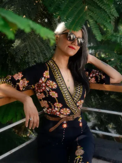 The floral embroidery adds a beautiful, detailed touch to this everyday look.