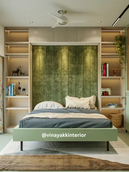 This master bedroom is a perfect example of functional design. The bed is flanked by custom-built open shelves with integrated lighting, providing ample space for books and decor without cluttering the room.