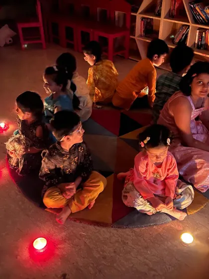 The magical glow of diyas during our Diwali celebration. We gathered in a circle to share stories and enjoy the beautiful, peaceful atmosphere created by the lights.