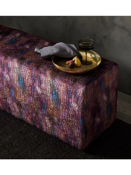 The 'Nikita' collection is a dramatic take on a reptile scale print. Available in vibrant, metallic colours, these fabrics are suitable for a myriad of glamorous and adventurous styles.