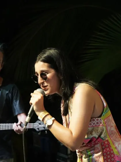 A close-up shot from our performance at The Wassup Flea. We bring our passion and energy, whether it's a hot summer day or a cool evening.