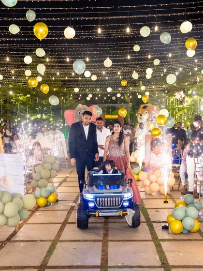 Making a grand entrance at Eshaan's safari party. The birthday boy arrives in style in his own mini jeep, driving down a path lit by sparklers and fairy lights, creating a spectacular and memorable moment for him and all the guests.