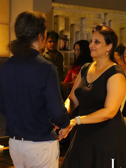 A candid shot of two people enjoying a dance. It’s a perfect example of how our socials bring people together, regardless of age or experience.