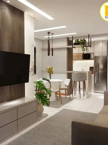 An open-plan layout where the living room flows into a dining area with a breakfast counter. This is a great solution for modern 2BHK flats in Mumbai.