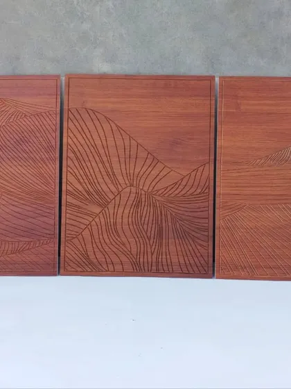 A direct view of the three-panel minimalist mountain art. This piece is perfect for adding a touch of understated nature to a modern or rustic interior.