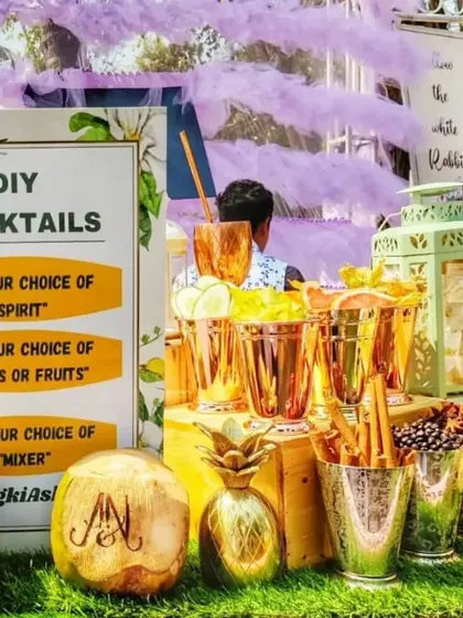 I create interactive experiences like this DIY Cocktails station. It's a great way to get guests mingling as they choose their own spirits, fresh fruits, and mixers to craft their perfect drink, guided by my expert team.