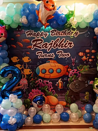 The complete Baby Shark themed decor, perfect for a fun-filled second birthday party at home.