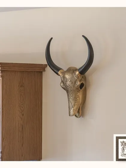 For a touch of rustic, Western-inspired charm, I chose this stunning engraved bull skull wall decor. The golden finish and intricate patterns elevate it from rustic to refined.