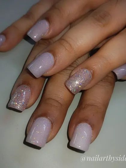A simple but stunning set featuring a holographic shimmer polish. The accent nails have a slightly chunkier glitter for added texture and sparkle.