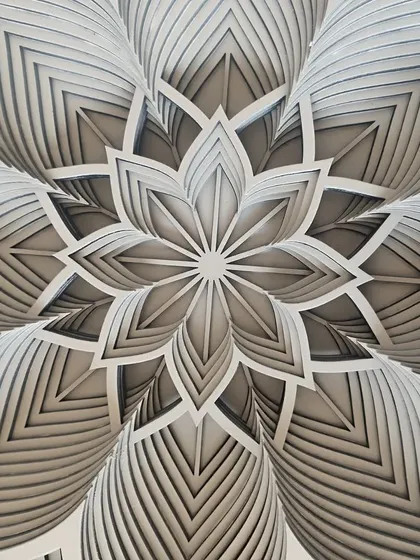 A close-up perspective of the Deep Lotus Mandala, showing the incredible depth created by its many layers. This piece is a true testament to complex geometric design.