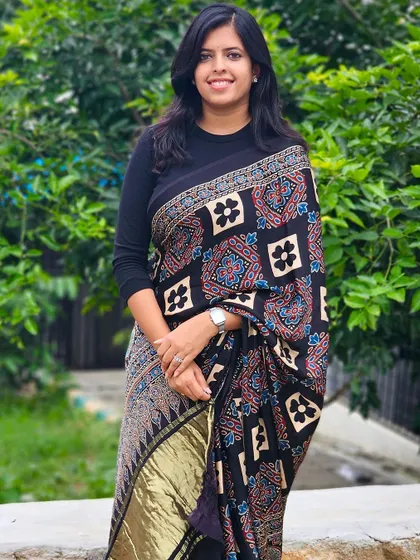 The full look of the Ajrakh saree, showcasing its elegant drape and timeless appeal. It's a perfect blend of tradition and style.