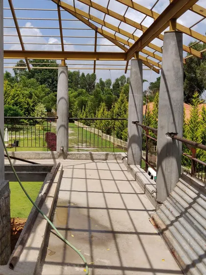 Site stories from Chikmagalur. The play of light and shadow across the structure is a key element we design for, creating a dynamic experience.