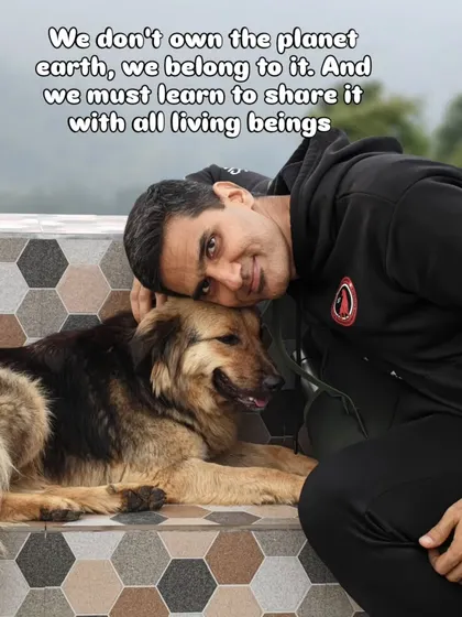 We don't own the planet earth; we belong to it. A moment of connection and shared love with a furry friend in the mountains.