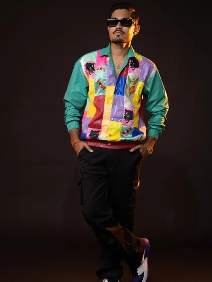 It was super fun styling YouTuber Amit Sharma, "The Indian Unboxer." We created a range of cool, casual looks, including this one with a vibrant patchwork jacket, reflecting his energetic personality.