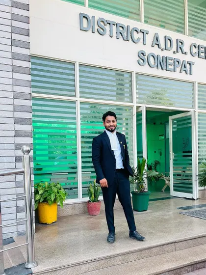 A confident stance at the Sonipat District A.D.R. Centre. My aim is to make my clients feel empowered, no matter the location.