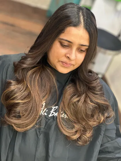 A close-up of the rich, flowing brunette waves.