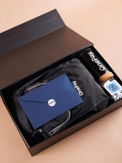 Another view of the neatly packed OnePay welcome kit. We ensure every detail is perfect, reflecting the quality and care of your company's brand.