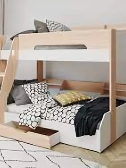 A clean and simple bunk bed in white and light wood, with a storage drawer underneath.