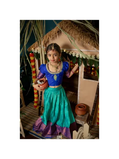 A beautiful portrait of a young girl in traditional attire for our Pongal celebration shoot.