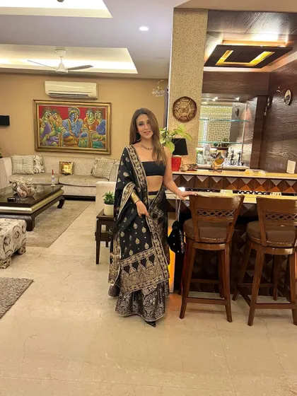 Posing in my black and gold outfit. I love how the traditional motifs are given a modern feel in this ensemble.