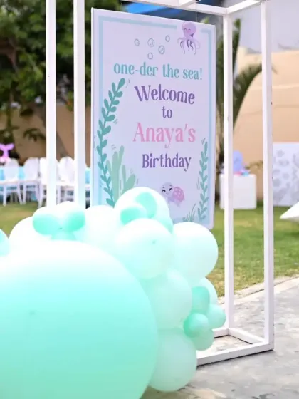 This duplicate of the welcome sign shows the attention to detail in creating a cohesive and immersive themed experience from the moment guests arrive.