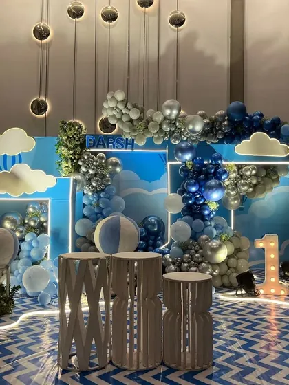 A full view of the sky-themed stage, showing the beautiful overhead lighting of the venue.