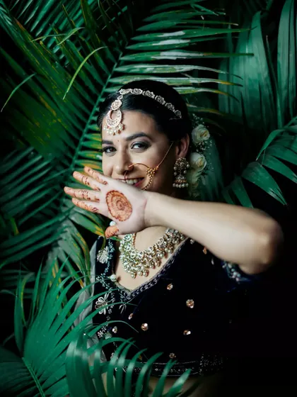 A playful and artistic shot from a creative photoshoot, with a focus on expression and mood.