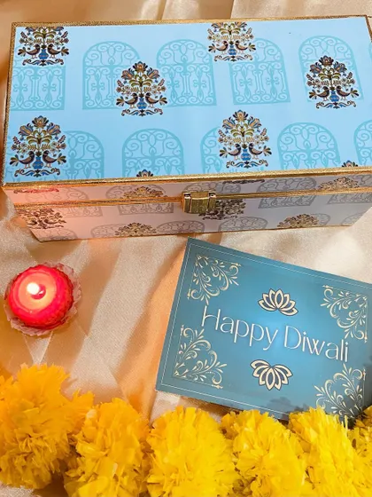 The beautiful exterior of our blue patterned trunk box, a keepsake item for any recipient.
