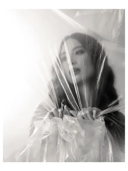An artistic and conceptual portrait that tells a story of breaking through. This fine art session was about capturing a feeling of emergence and strength in a visually striking way.