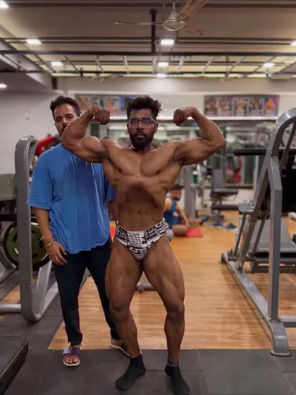Front double biceps pose check. We are getting ready for a practice show to test our conditioning and presentation.