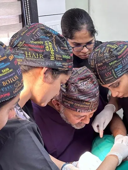 Observing the finer points of a surgical technique. My goal is to continuously expand my expertise to provide comprehensive care for all skin, hair, and nail conditions.