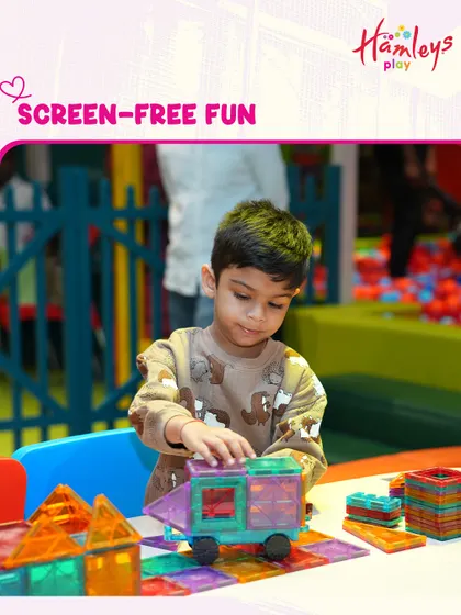 I provide plenty of opportunities for screen-free fun that is both engaging and educational. Building with these magnetic tiles is a perfect example of learning through play.