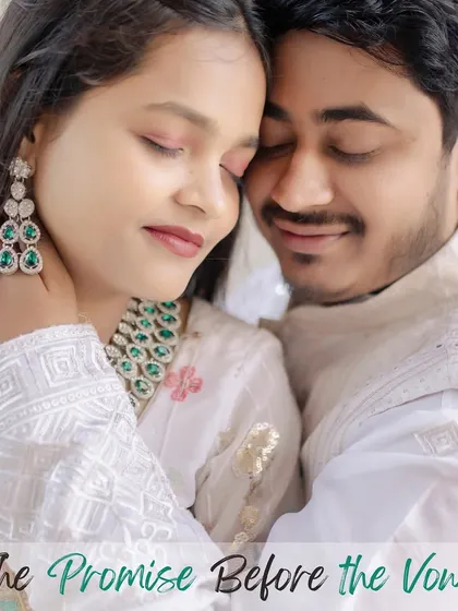 An intimate close-up of a couple in elegant white traditional wear, highlighting the beautiful details of their attire and the promise before the vows.