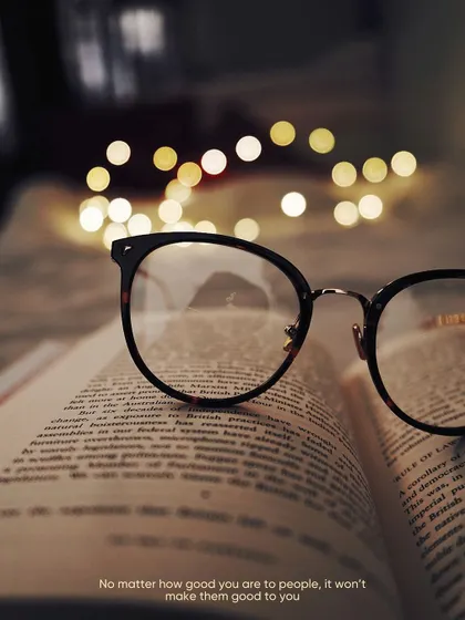 Another take on the glasses and book theme, this time with a beautiful bokeh background. Playing with depth of field is one of my favorite techniques.