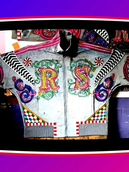 Another look at the finished personalized hoodie, presented with a digital frame to highlight the artwork. The vibrant pinks, greens, and yellows stand out against the grey fabric, showing how the art transforms the garment.