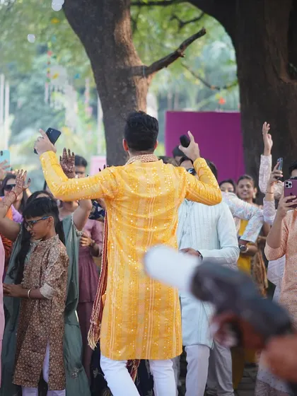 Getting everyone involved in the celebration. A view from the back shows how I engage with the entire audience.