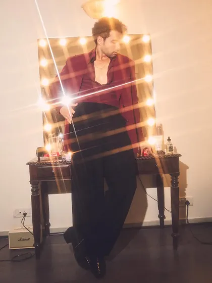 For the Pinkvilla Style Awards, I put Siddhant Chaturvedi in a custom Manish Malhotra look. The rich burgundy jacket and flared trousers create a dramatic, 70s-inspired silhouette.