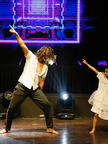 Another angle of my duet with a young student, showcasing the storytelling and connection we build through contemporary dance.