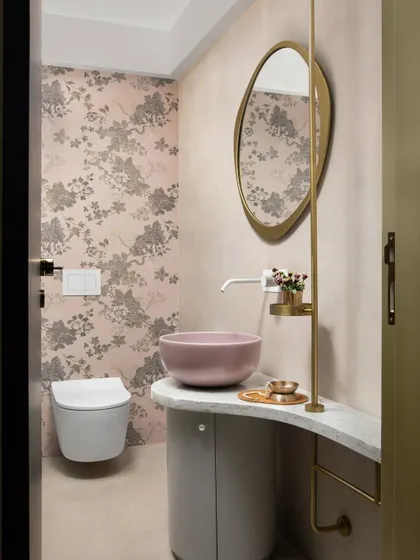 Splashes of lilac and grey, adorned with touches of brass. I designed this whimsical sanctuary for a child's bathroom, where every splash creates a canvas of childhood tales and happy memories.