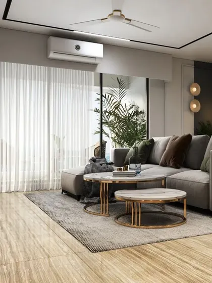 Natural light floods this living room, which features a comfortable sectional sofa and marble-look flooring. The design is perfect for relaxing and unwinding.