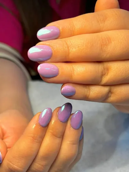Soft, subtle, and oh-so-lovely in lilac. This aura nail design features a beautiful blend of purple shades for a delicate and dreamy manicure.