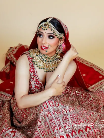This is a modern take on a traditional bride. The makeup is glamorous yet feels light, enhancing her features without overpowering her natural beauty.
