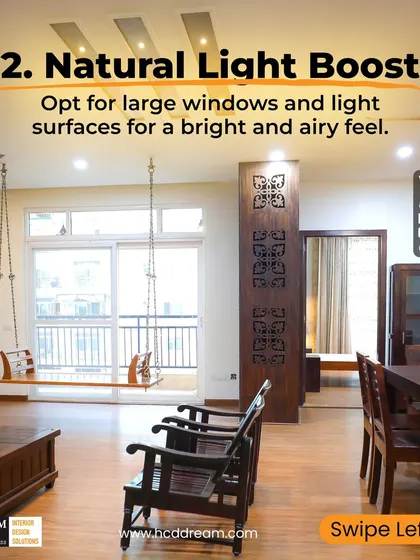 Tip #2 for Human-Centric Design: Boost natural light. We use large windows and light surfaces to create a bright and airy feel, as seen in this living room with a traditional swing.