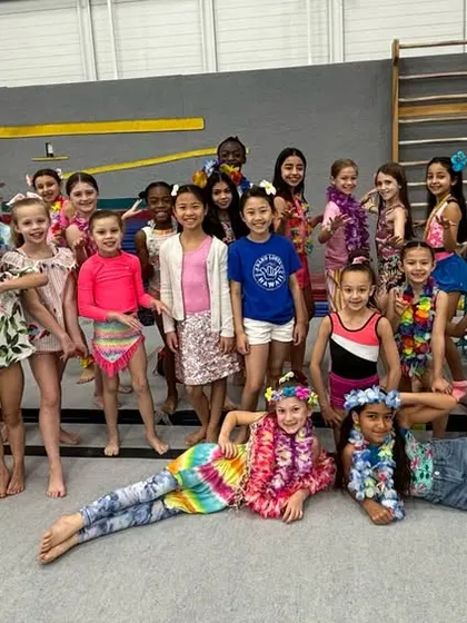 Another fun group shot from our Luau party practice. These spirit weeks are a highlight for our teams, filled with fun, friendship, and gymnastics.