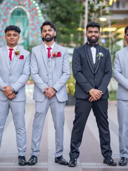 The groom and his groomsmen looking sharp. Capturing the camaraderie and fun of the wedding party is just as important as the couple's portraits.